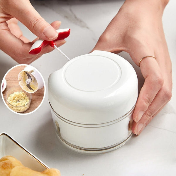 Picador multifuncional de cocina Komprita